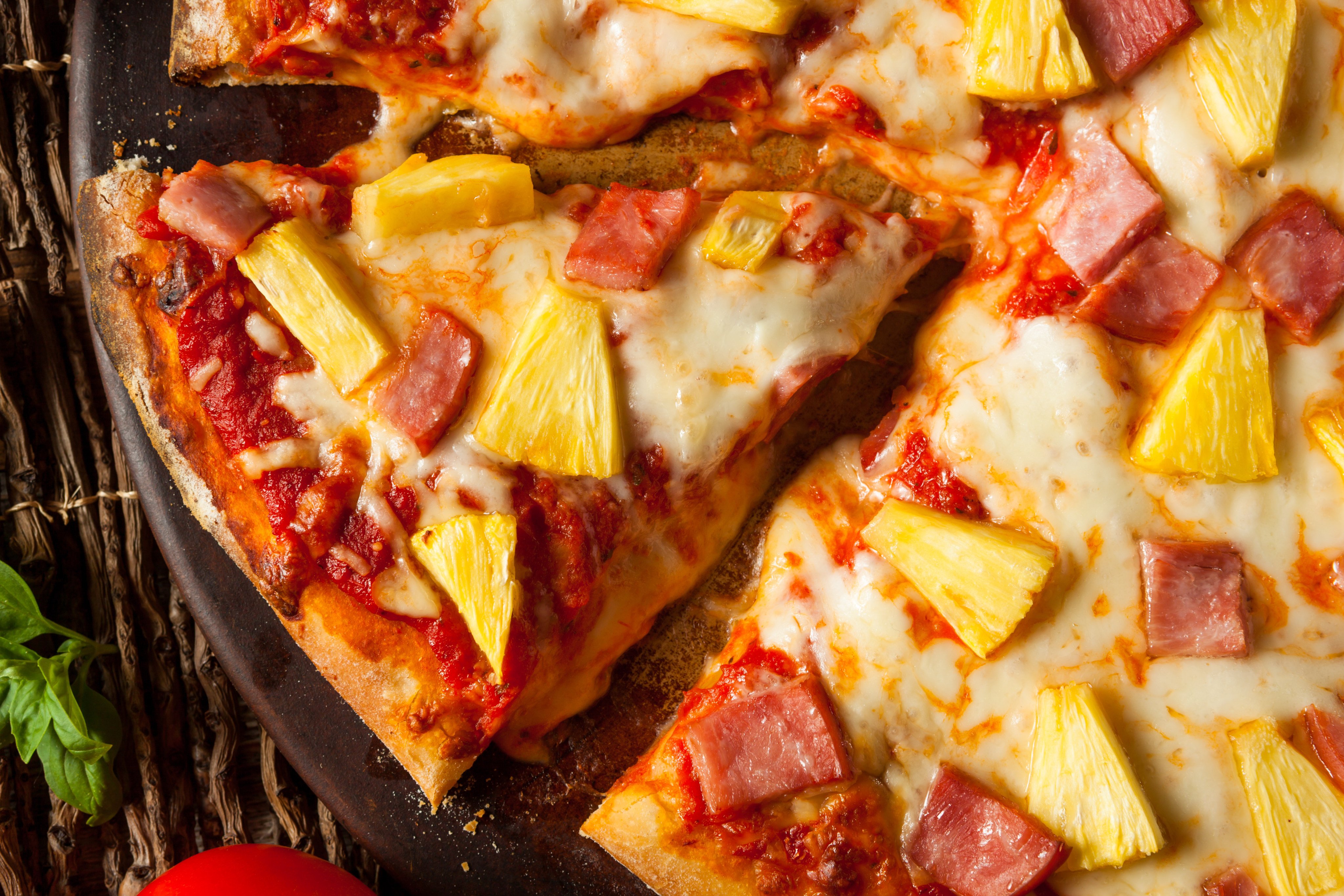 Stock Photo ID: 431092120

Homemade Pineapple and Ham Hawaiian Pizza Ready to Eat. Shutterstock 