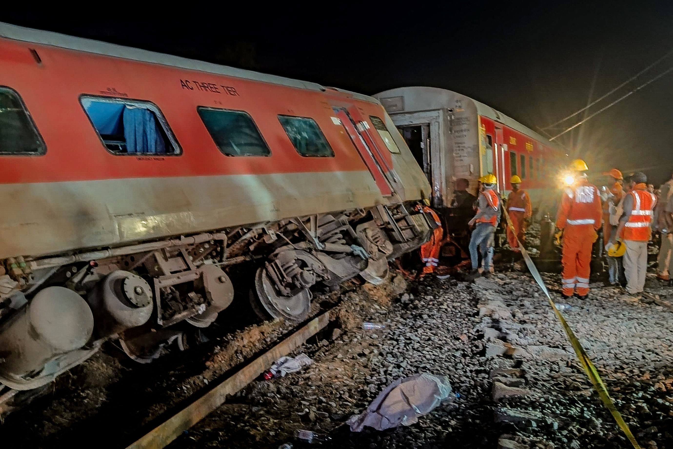 Rescue personnel at a rescue operation near the site of a train accident in Gonda district of India’s Uttar Pradesh on July 18. Photo: AFP