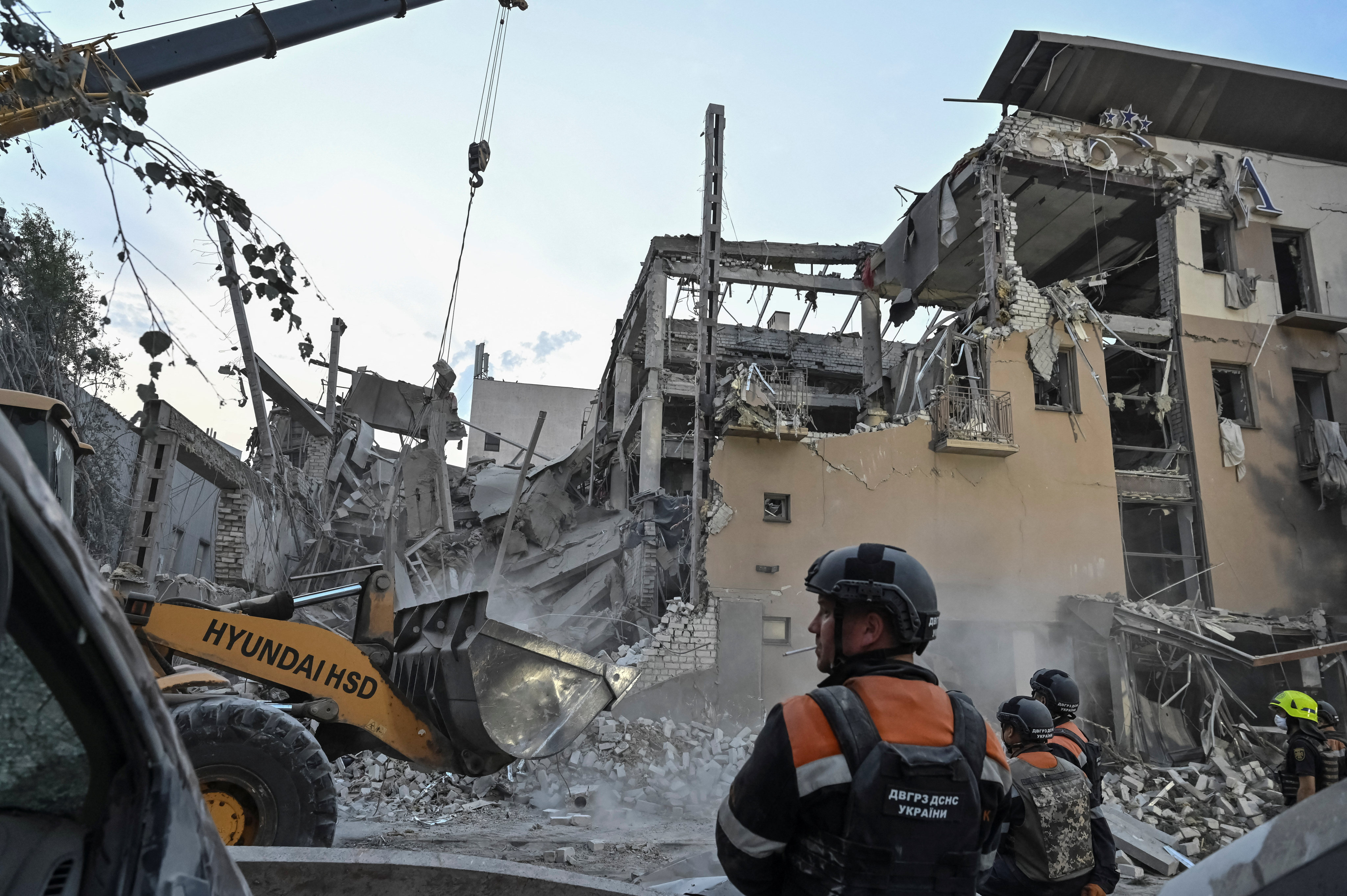 Rescuers at the site of a Russian missile strike in Kryvyi Rih, Ukraine on Tuesday. Photo: Reuters