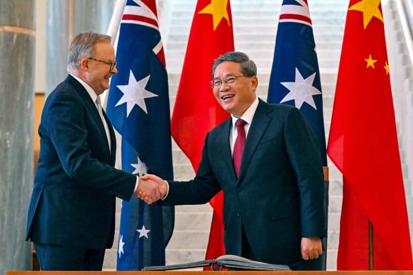 Chinese Premier Li Qiang is greeted by Australian Prime Minister Anthony Albanese at Parliament House in Canberra, Australia, on Monday. Photo: AP 