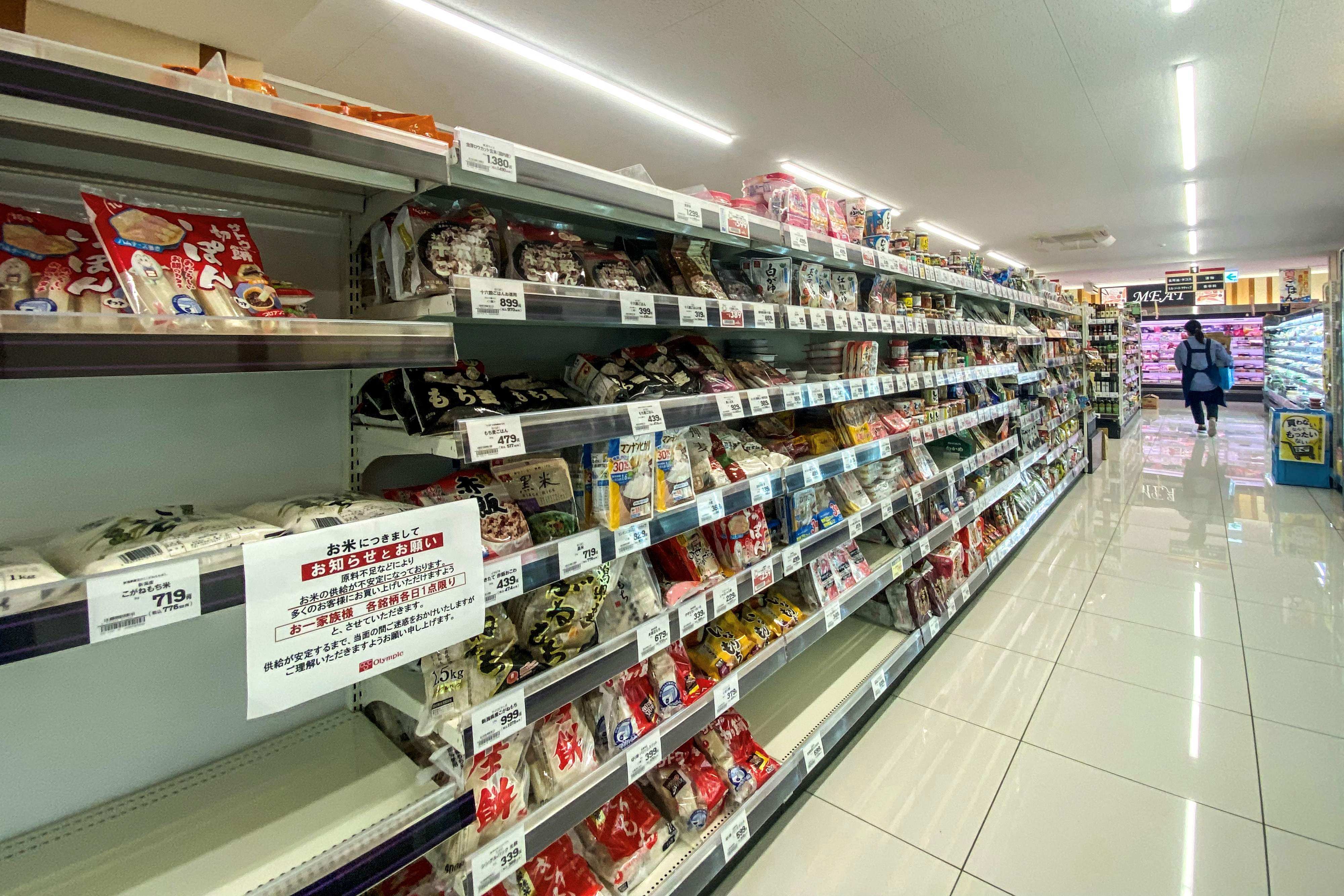 Empty shelves of rice are pictured in a supermarket in Japan. Photo: AFP