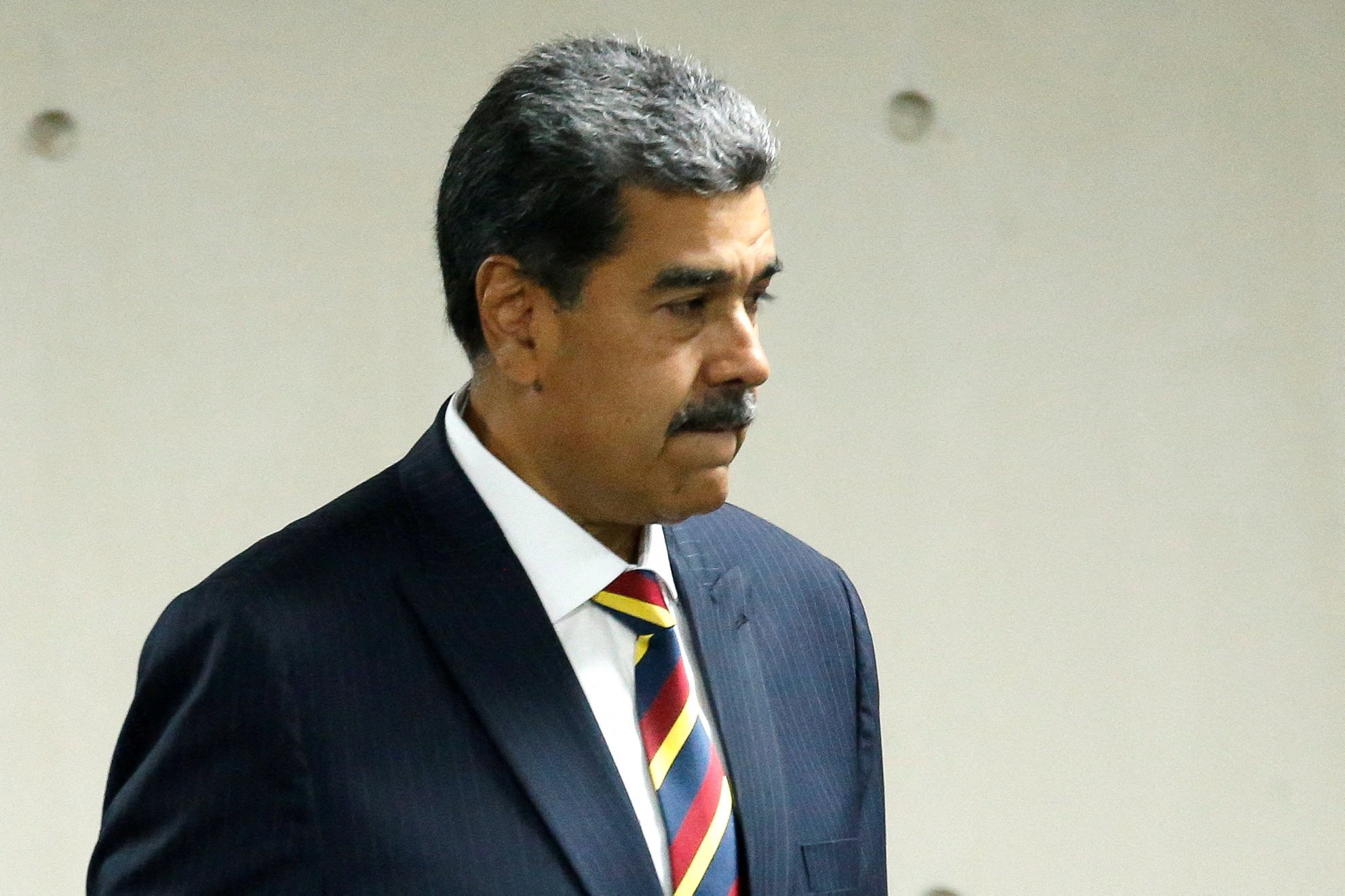 Venezuelan President Nicolas Maduro walks through the Supreme Tribunal of Justice in Caracas on Friday. Photo: Reuters