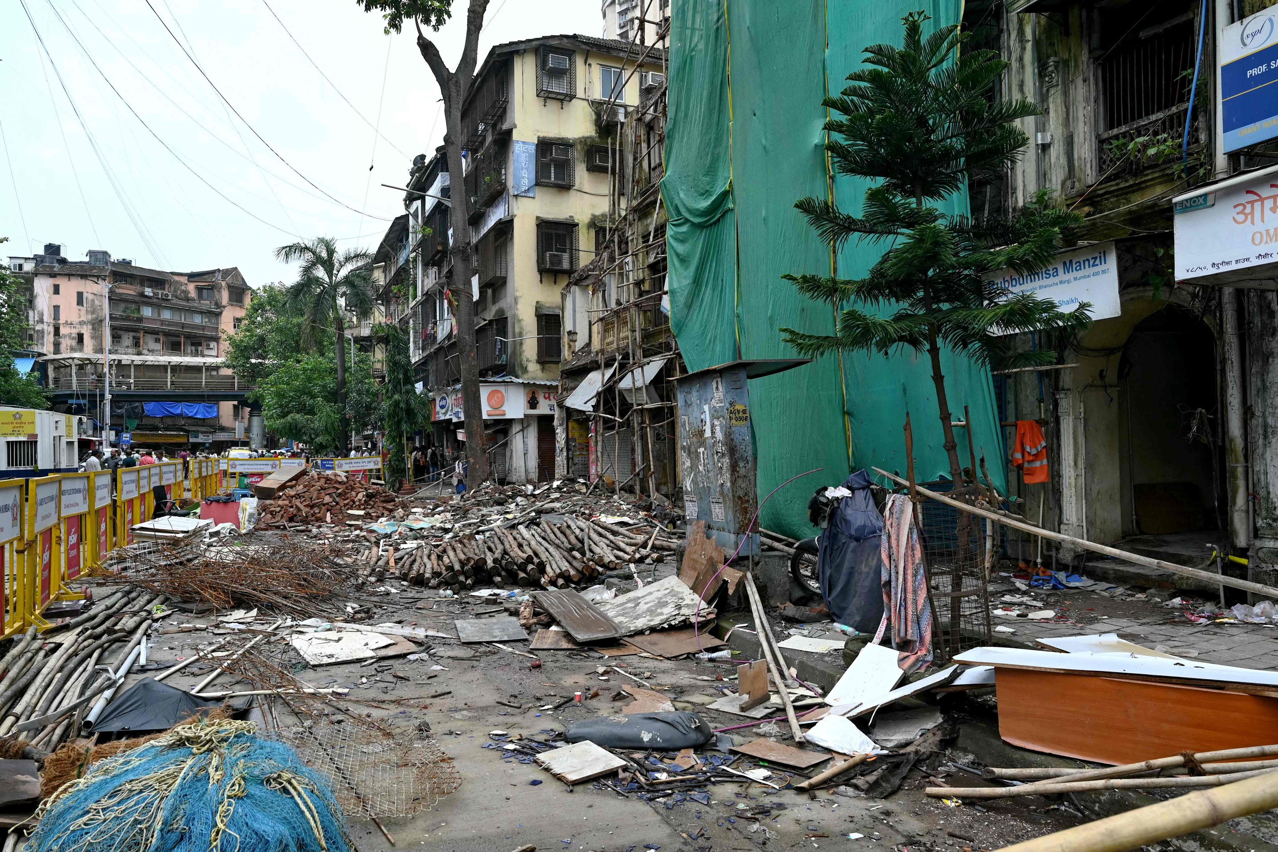 Mumbai’s ageing buildings pose deadly risks during monsoons, but high rents and limited affordable housing keep residents from evacuating. Photo: AFP