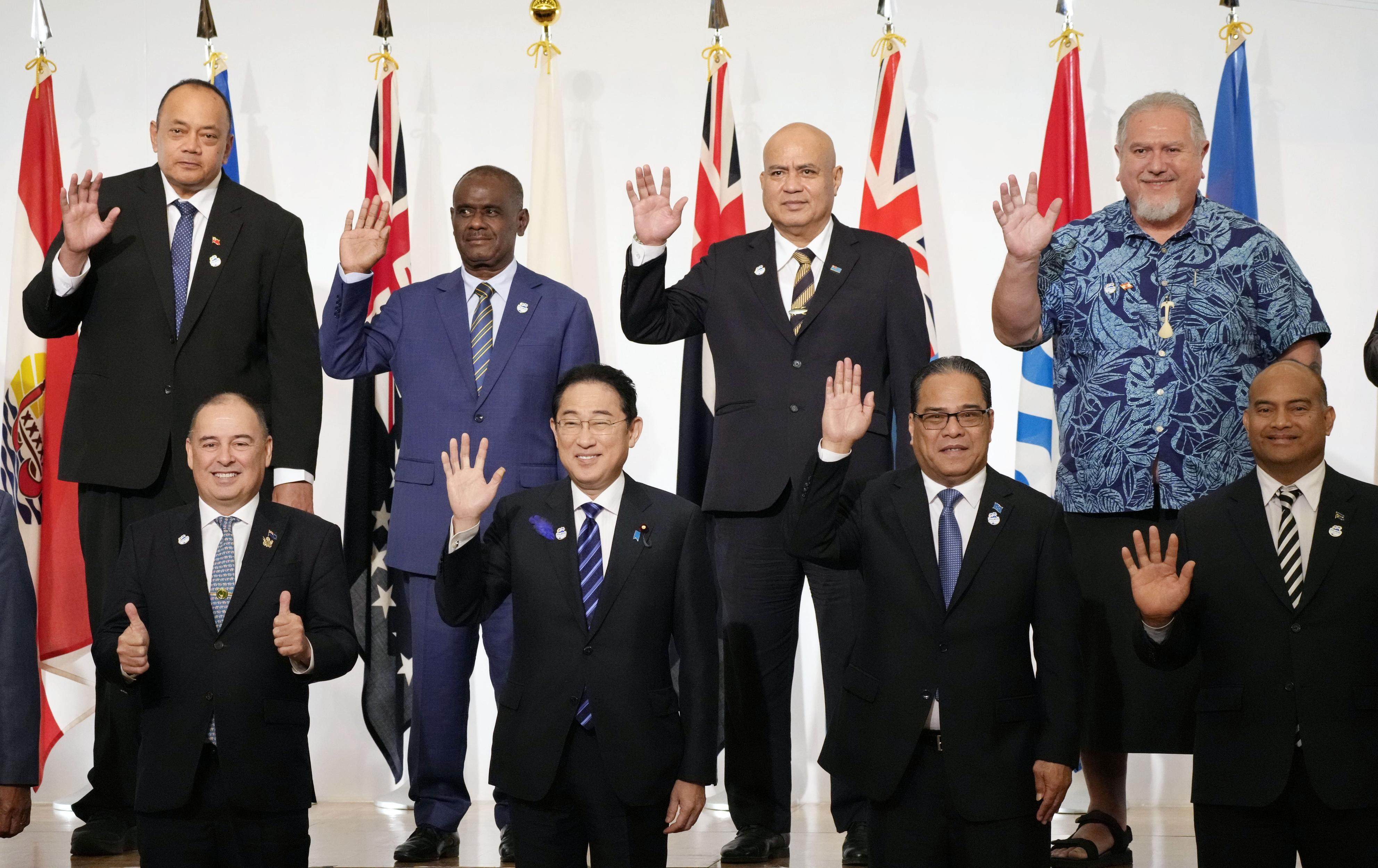 Japanese Prime Minister Fumio Kishida (bottom row, second from left) and other participants of the 10th Pacific Islands Leaders Meeting in Tokyo pose for a photo on Thursday. Photo: Kyodo